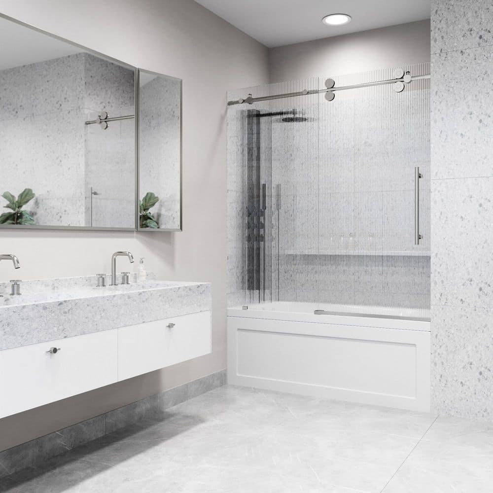 Elan Frameless Sliding Tub Door in Stainless Steel with Fluted Glass