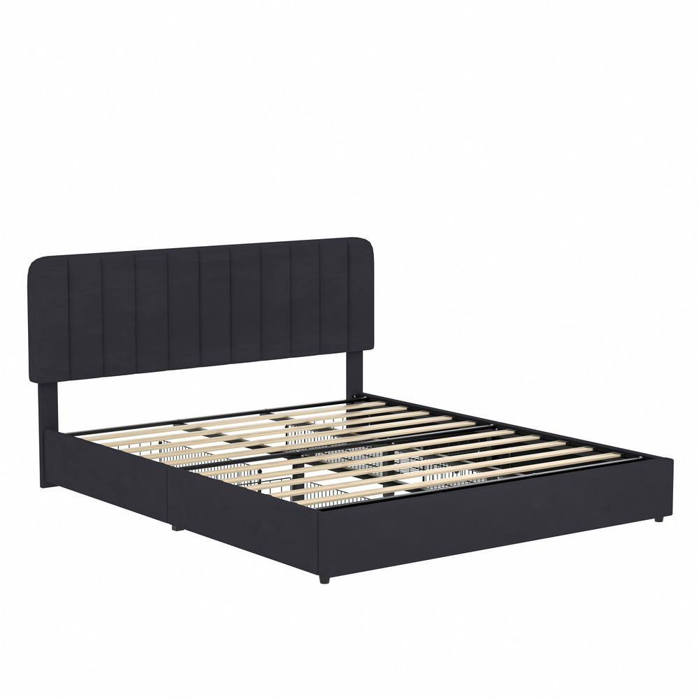 A black platform bed frame with a channel-tufted headboard and wooden slats.
