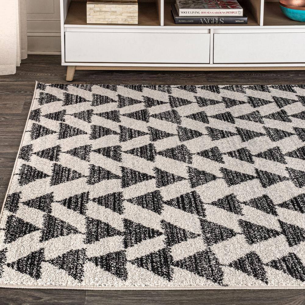 Aisha Cream and Black Geometric 10' x 14' Synthetic Area Rug