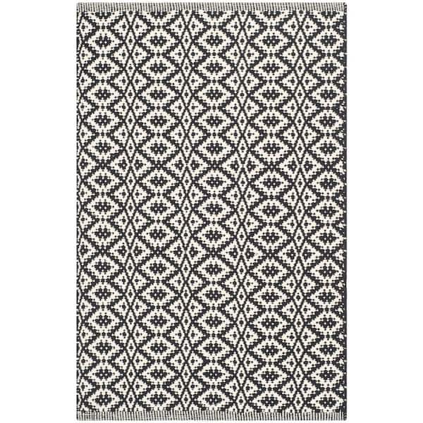 SAFAVIEH Montauk Ivory/Black Doormat 3 ft. x 4 ft. Solid Area Rug