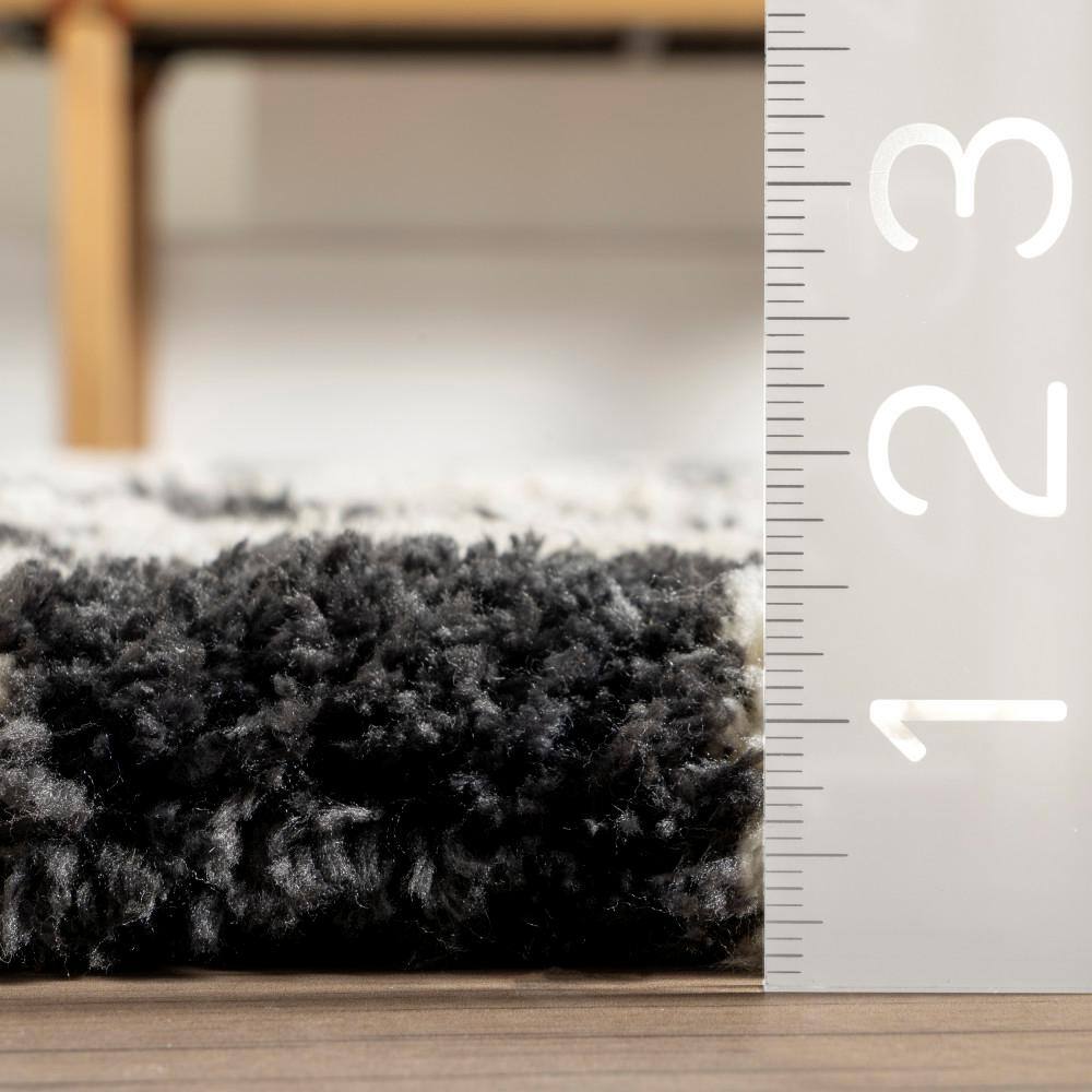 Ivory and Black Checkered Shag Synthetic Area Rug