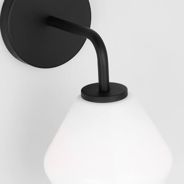 Generation Lighting - Jett 6 in. 1-Light Midnight Black Transitional Dimmable Indoor Bathroom Vanity Light with Milk Glass Shade