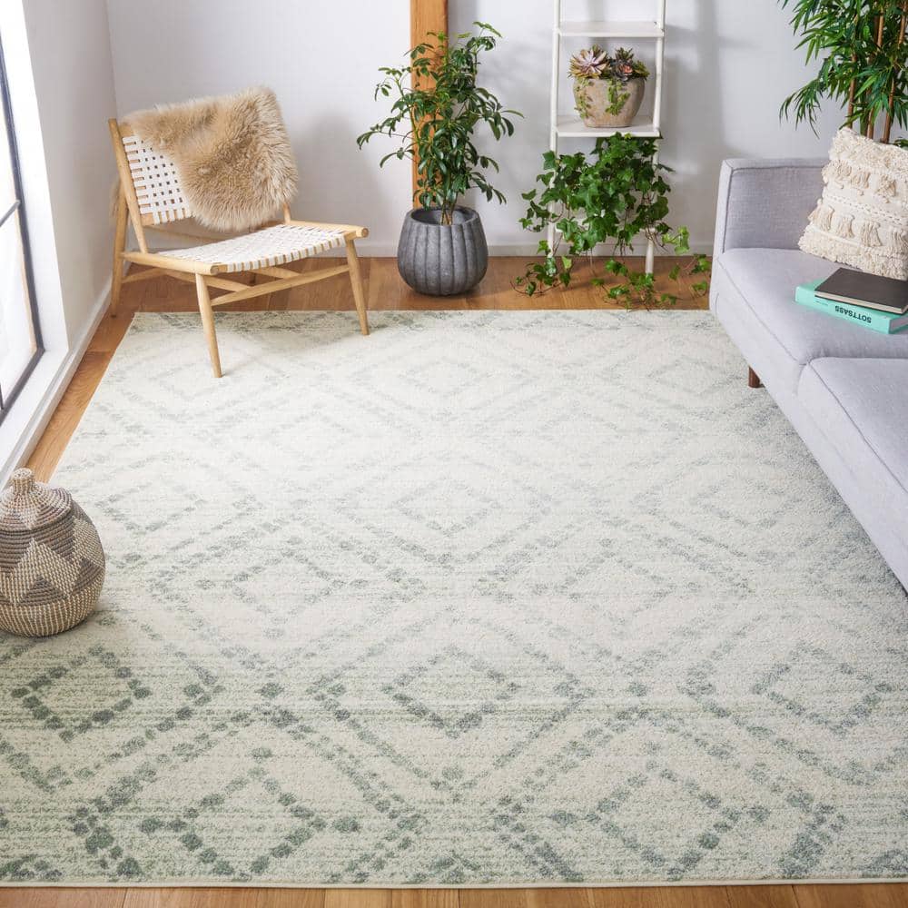 Ivory and Green Geometric 10' x 14' Synthetic Area Rug