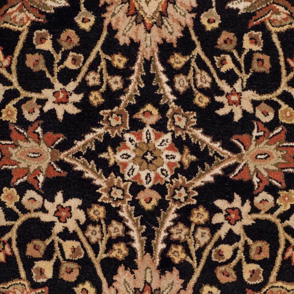Handmade Black and Ivory Tufted Wool Area Rug