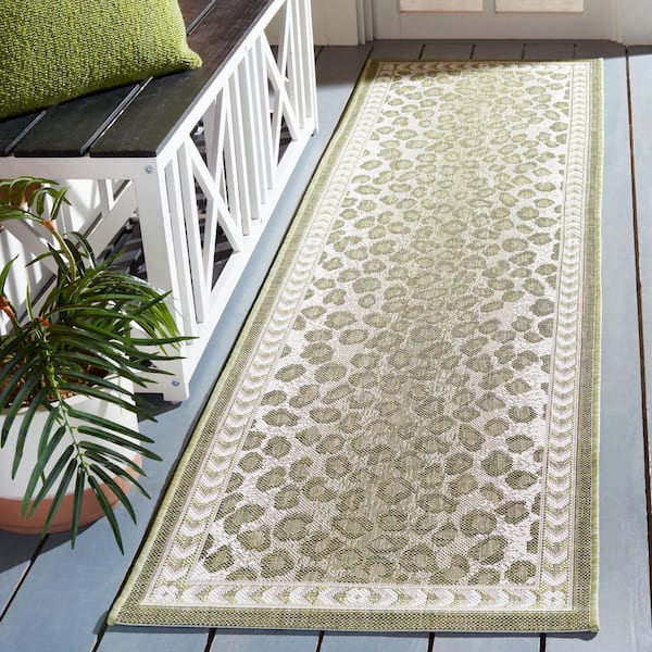 Courtyard Light Green/Ivory 2 ft. x 8 ft. Border Cheetah Indoor/Outdoor Runner Rug