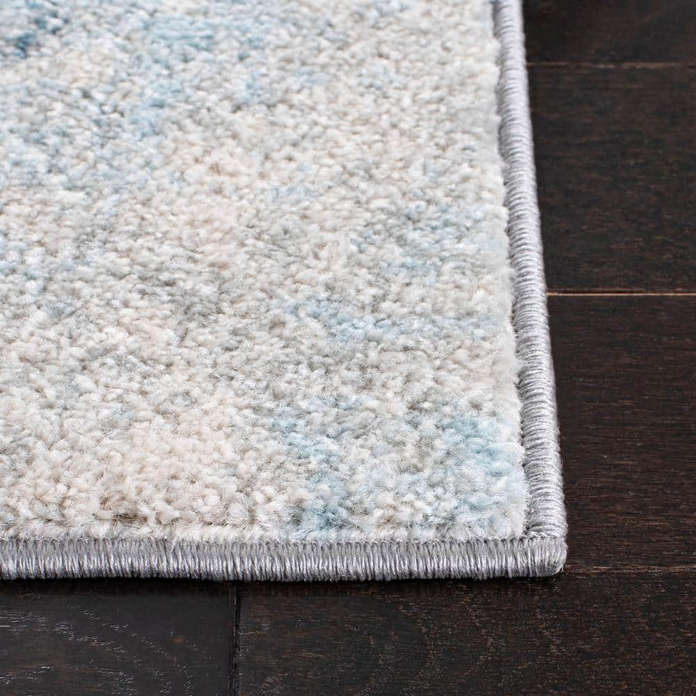 Boho-Chic Ivory/Blue Synthetic 9' x 12' Reversible Area Rug