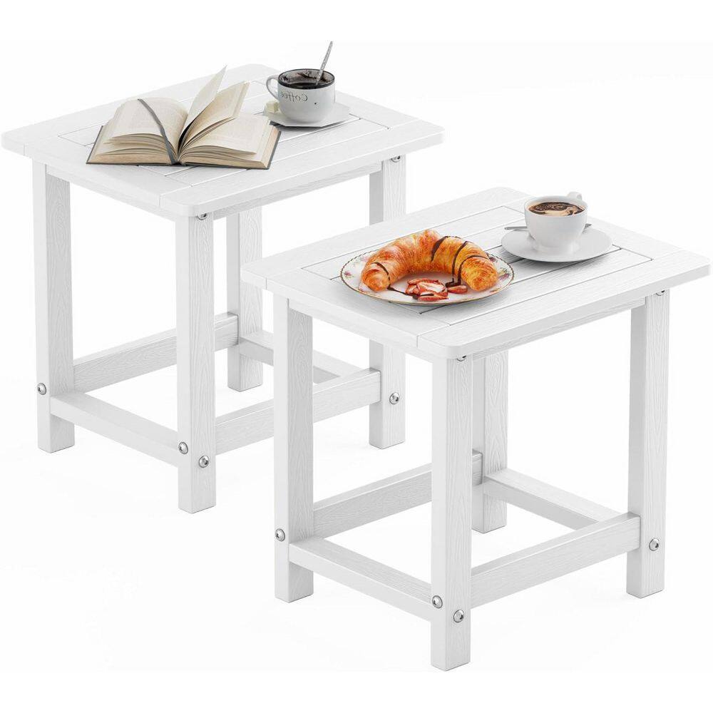 Set of two white plastic modern side tables.