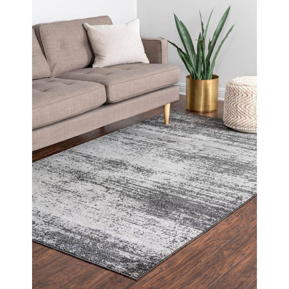 Luxurious Dark Gray Tufted 6' x 9' Easy-Care Synthetic Rug