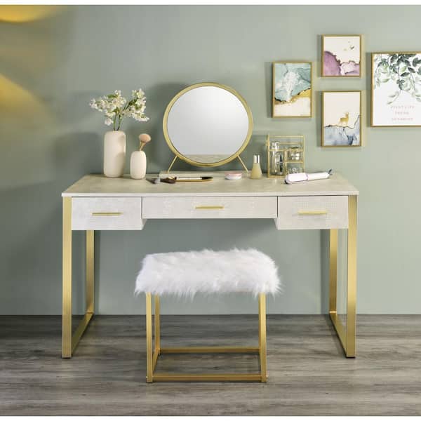 https://images.thdstatic.com/productImages/fbf10aeb-df8c-4473-8d41-5ec4f6be722d/svn/antique-white-and-champagne-acme-furniture-makeup-vanities-ac00841-31_600.jpg