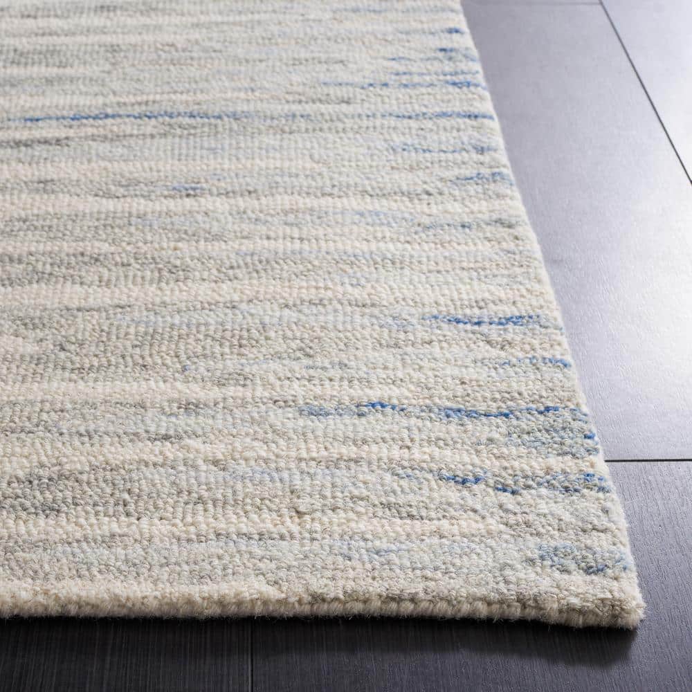 Handmade Abstract Ivory and Light Blue Wool Area Rug, 4' x 6'