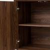 Interior view of a wooden cabinet with shelves.