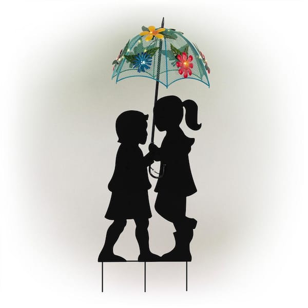 Alpine Corporation 39 in. Tall Outdoor Solar Powered LED Lights Girl and Boy Silhouette with Umbrella Yard Statue
