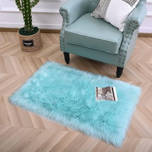 Light Blue 2 ft. x 3 ft. Sheepskin Faux Furry Cozy Area Rug