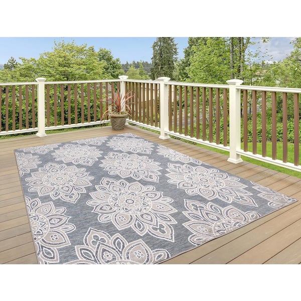 https://images.thdstatic.com/productImages/fc4f5a9c-8822-4d49-a40b-80de9211aae8/svn/blue-stylewell-outdoor-rugs-28012-1d_600.jpg