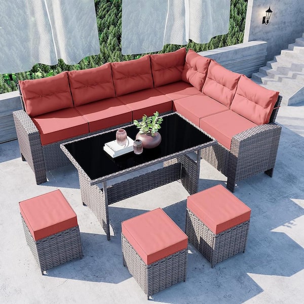 Halmuz 7-Piece Wicker Outdoor Dining Table Set with Ottomans and Cushions Red