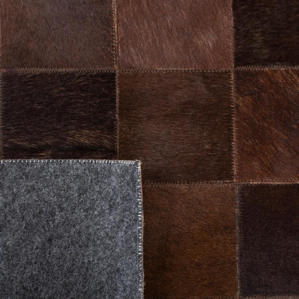 Artisan Ivory Geometric Hand-Stitched Cowhide 5' x 8' Area Rug