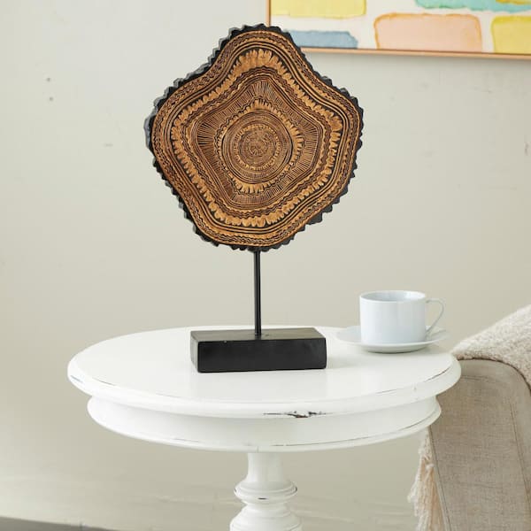 Litton Lane 17 in. Brown Resin Abstract Carved Tribal Sculpture with Black Stand and Wavy Edge