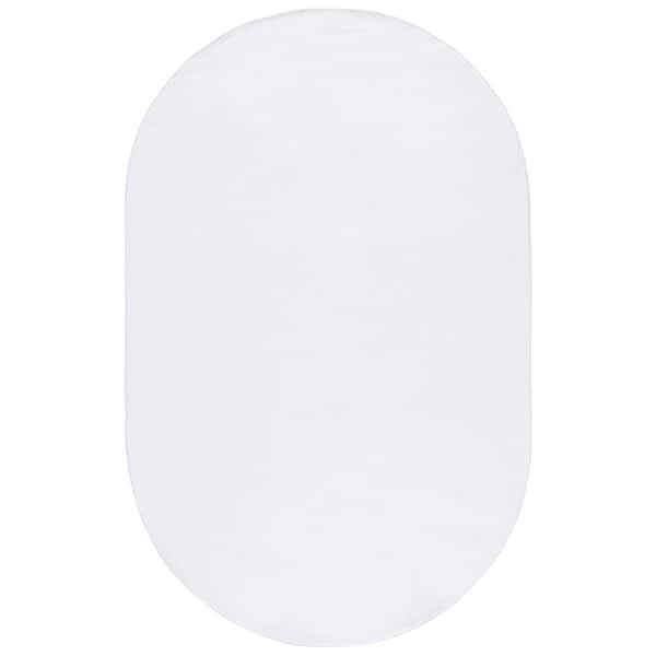 SAFAVIEH Loft Ivory 5 ft. x 8 ft. Machine Washable Modern Solid Oval Area Rug