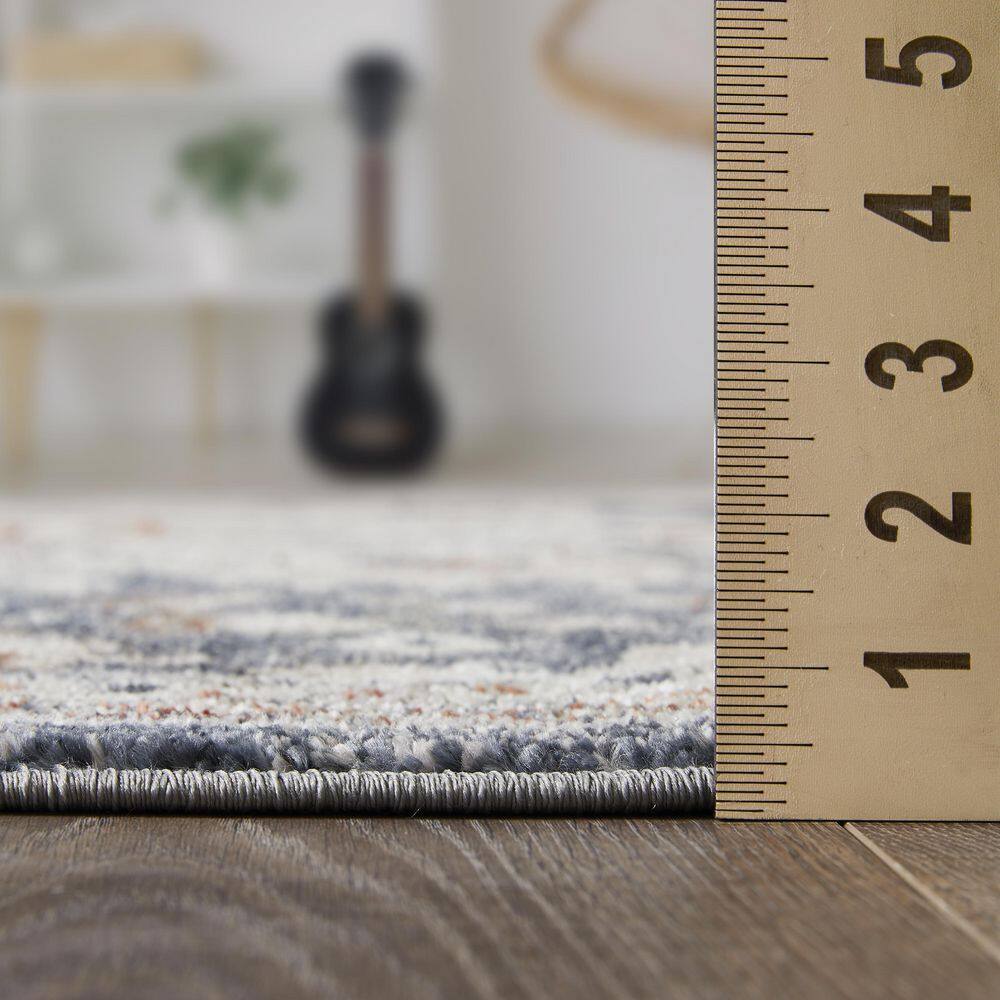 Blue and Beige 4' x 6' Oriental Synthetic Area Rug