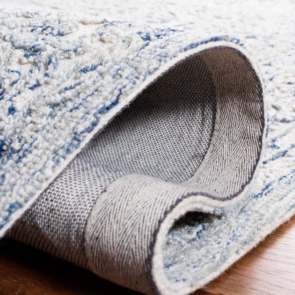 Ivory and Blue Hand-Tufted Wool 8' x 10' Area Rug