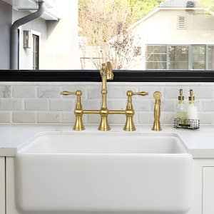 Double Handle Bridge Kitchen Faucet with Side Sprayer in Brushed Gold