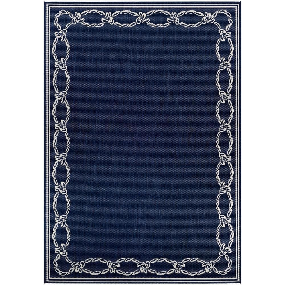 Ivory and Indigo Round Synthetic Indoor/Outdoor Area Rug