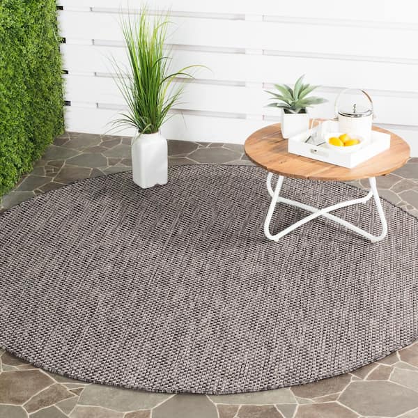Courtyard Black/Beige 9 ft. x 9 ft. Solid Distressed Indoor/Outdoor Patio  Round Area Rug