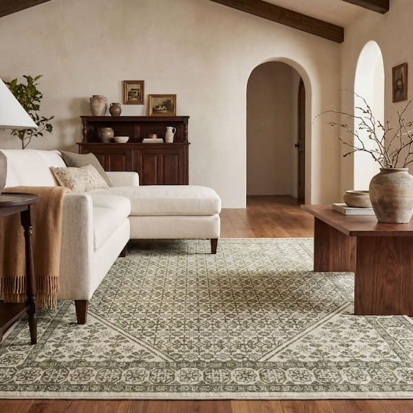 Arlena 6 ft. x 9 ft. Green Border Area Rug