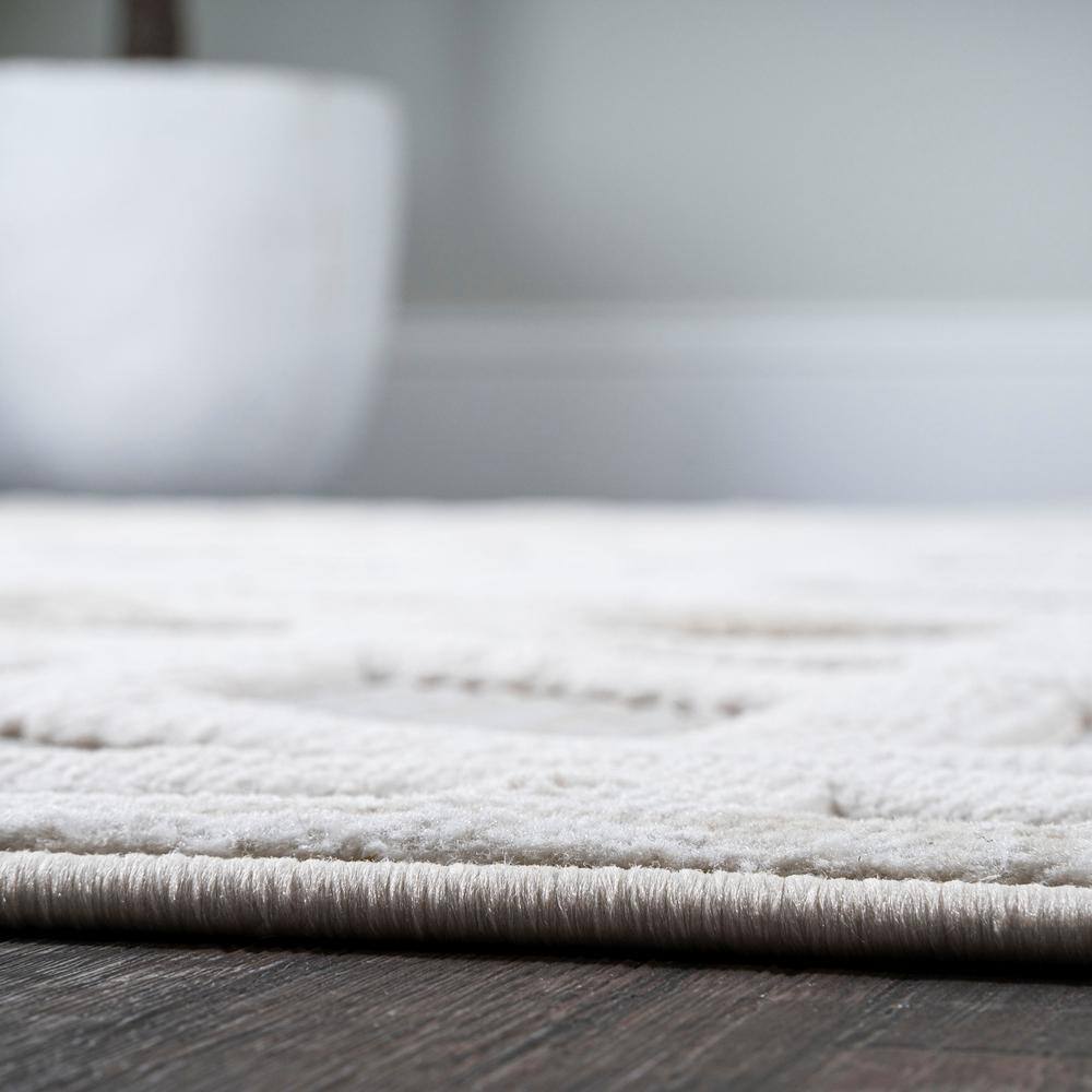 Ivory Geometric 4' x 6' Handmade Synthetic Indoor/Outdoor Rug