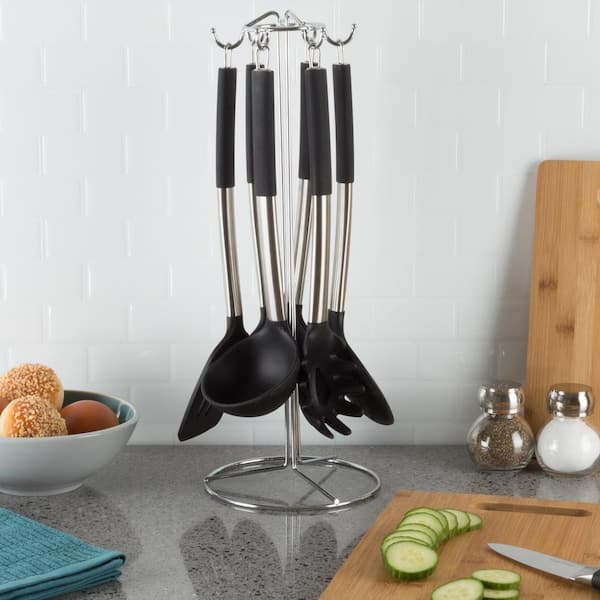 https://images.thdstatic.com/productImages/fd3fe4f6-e693-4133-bb80-cc1e4940ee49/svn/black-and-silver-kitchen-utensil-sets-840525unh-c3_600.jpg