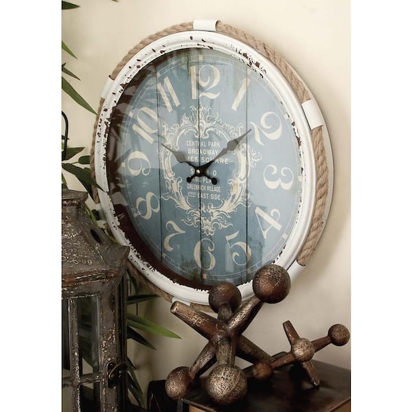 Photo 1 of Blue Metal Coastal Wall Clock