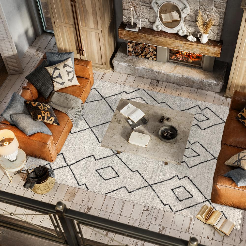 Cream and Black Geometric Synthetic 3' x 5' Area Rug