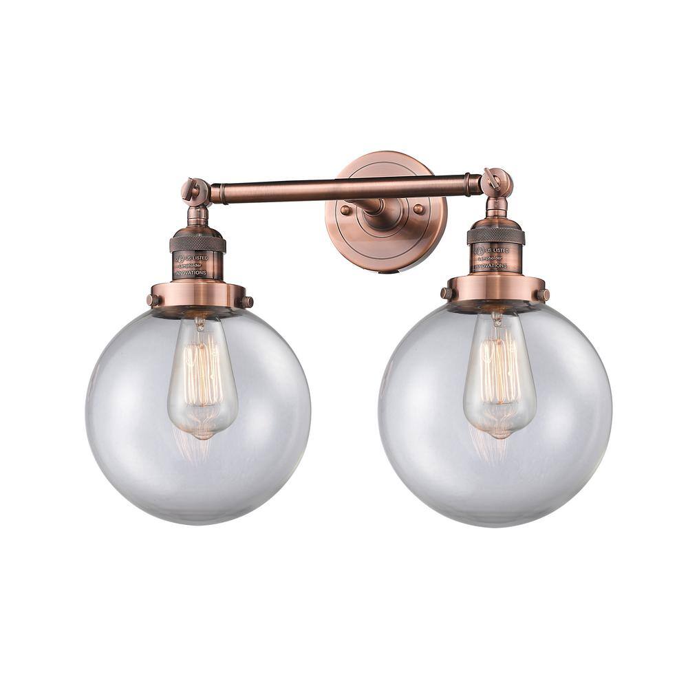 Beacon 19 in. 2 Light Clear, Antique Copper Vanity Light with Clear Glass Shade price history on PriceWatchPro