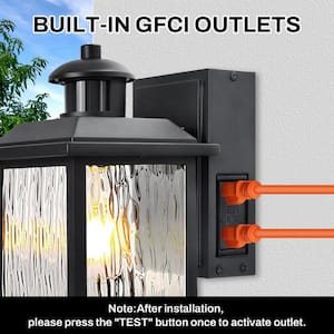 11 in. Black Motion Sensor Dusk to Dawn Outdoor Wall Sconce with Outlet 1-Light Water Rippled Glass Shade Lamp