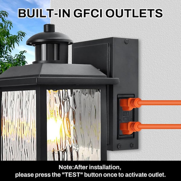 11 in. Black Motion Sensor Dusk to Dawn Outdoor Wall Sconce with Outlet 1-Light Water Rippled Glass Shade Lamp