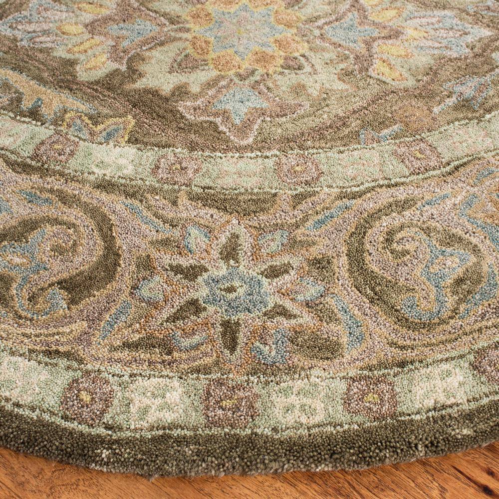 Handmade Tufted Round Wool Rug in Brown and Beige
