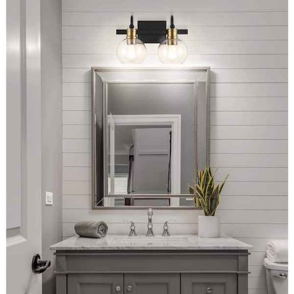 https://images.thdstatic.com/productImages/fdf9a36b-60ec-4227-abfd-3af88342d7f0/svn/black-brass-gold-jonathan-y-vanity-lighting-jyl3527a-a0_600.jpg