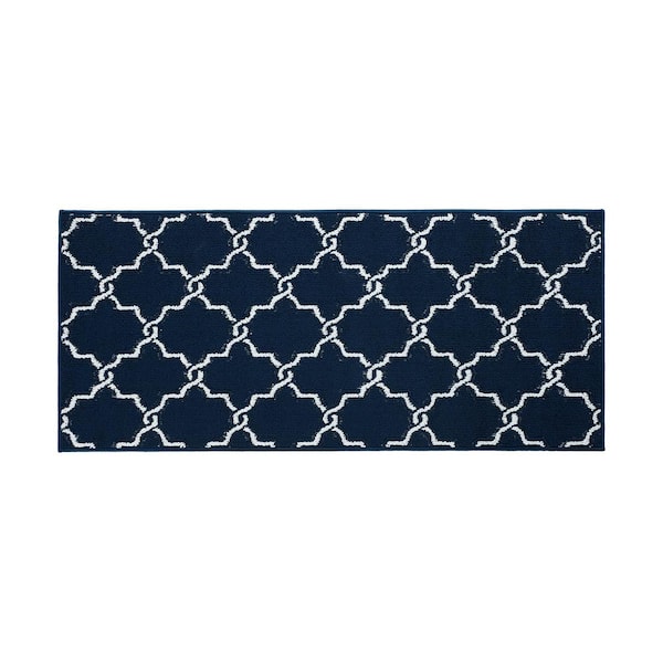 https://images.thdstatic.com/productImages/fdf9c1d2-6fc8-4b30-b5a6-368431e92ef5/svn/navy-and-white-jean-pierre-area-rugs-yma016687-64_600.jpg