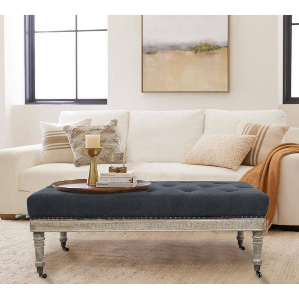 Antoinette Gray Tufted Upholstered Coffee Table with Distressed Wood Legs