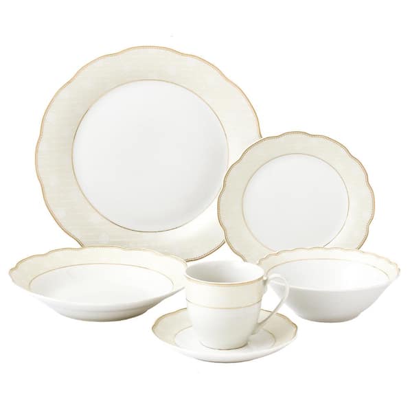 https://images.thdstatic.com/productImages/fe029ee5-d4b4-4e77-b763-85907170f7dd/svn/gold-accent-lorren-home-trends-dinnerware-sets-lh434-64_600.jpg