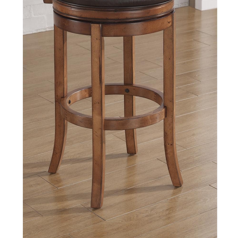 Transitional Brown Leather Swivel Chair with Carved Flower Detail