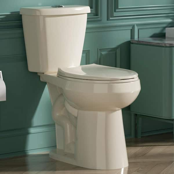 20 in. ADA Height Toilet 2-Piece 1.1/1.6 GPF Dual Flush Round Heightened Toilet in Bone Soft-Close Seat 12 in. Rough in