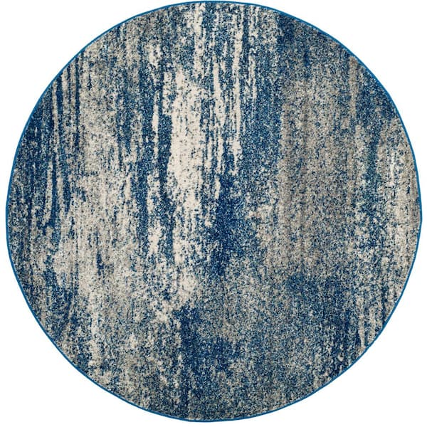 SAFAVIEH Evoke Navy/Ivory 7 ft. x 7 ft. Solid Round Area Rug
