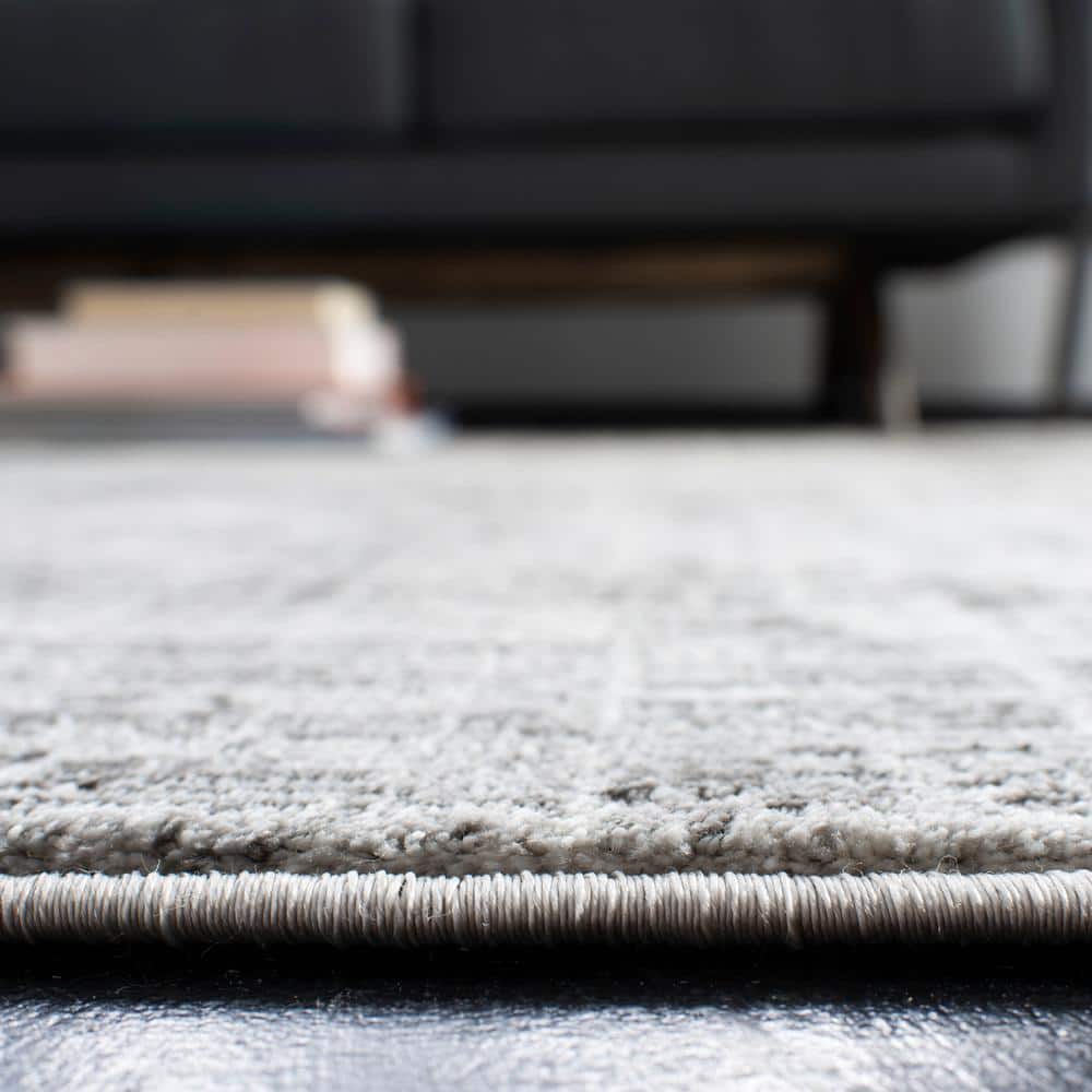 Abstract Swirls Hand-Knotted Grey and Dark Grey Synthetic Area Rug