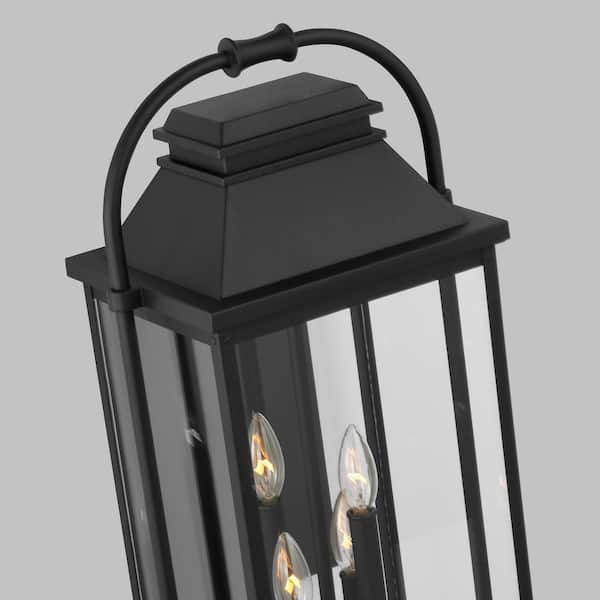 https://images.thdstatic.com/productImages/fe1dd01b-1cff-4686-86a2-151ab9831829/svn/textured-black-outdoor-sconces-ol13202txb-1f_600.jpg