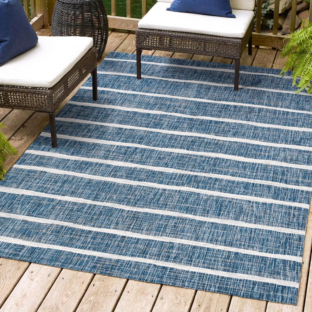 8' x 10' Blue and Ivory Synthetic Stripe Area Rug