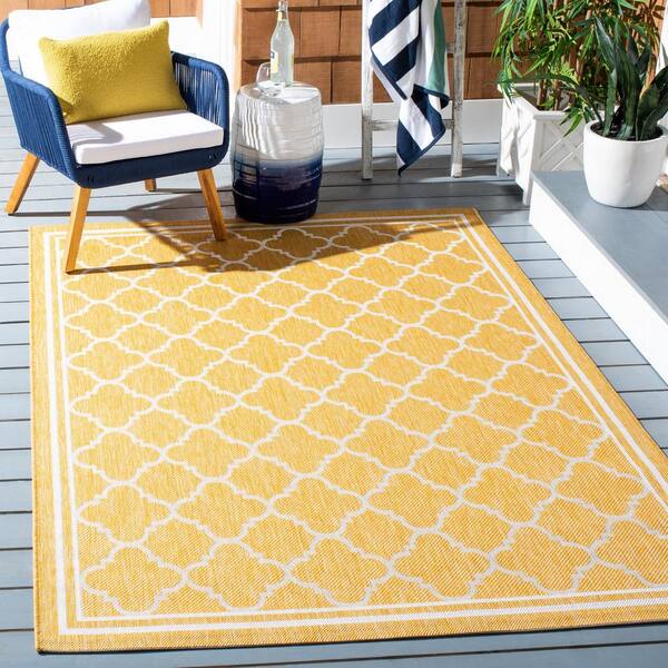 Courtyard Gold/Beige 7 ft. x 10 ft. Border Quatrefoil Indoor/Outdoor Patio  Area Rug