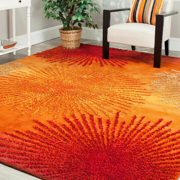 https://images.thdstatic.com/productImages/fe30d2e3-f17d-4b11-809a-0066c5bdca02/svn/rust-multi-safavieh-area-rugs-soh712r-8-31_600.jpg