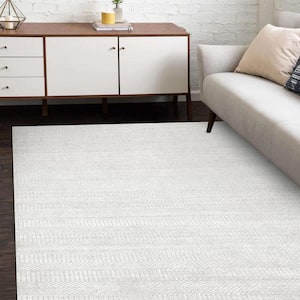 Sanam Contemporary Solid Ivory 5 ft. x 8 ft. Hand Loomed Area Rug