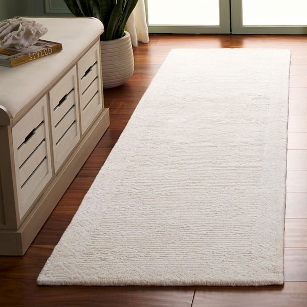 Rodeo Drive 2 ft. x 8 ft. Ivory Solid Geometric Border Runner Rug